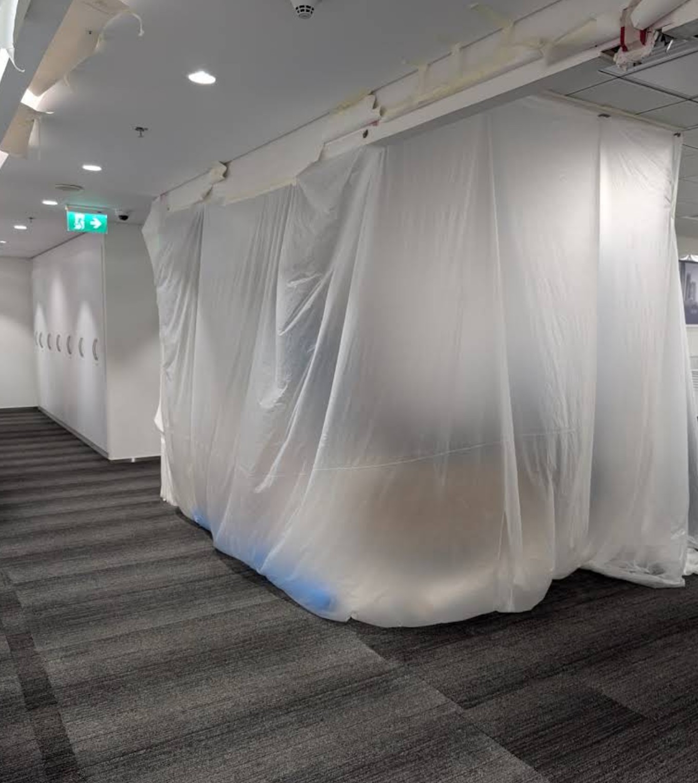 Protected commercial interior prepared for renovation work